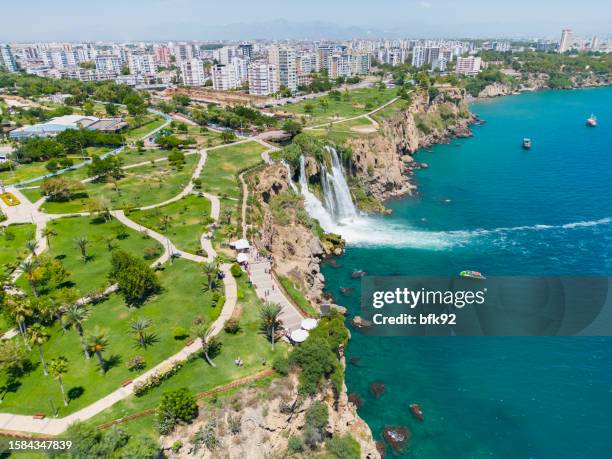 aerial view of duden waterfall dropping in mediterranean sea. - antalya city stockfoto's en -beelden