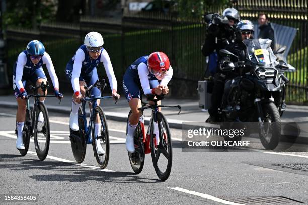Riders from France take part in the Team Time Trial Mixed Relay road race during the UCI Cycling World Championships in Glasgow, Scotland on August...