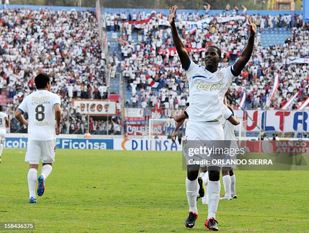 Olimpia´s Juan Carlos Garcia celebrates after scoring against Victoria during their Honduran Football League Aperture tournament final match at the...