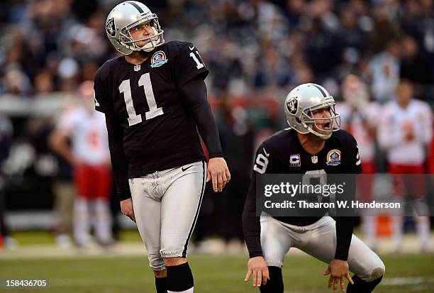 Sebastian Janikowski and Shane Lechler reacts after Janikowski missed a fifty-one yard field goal against the Kansas City Chiefs in the second...