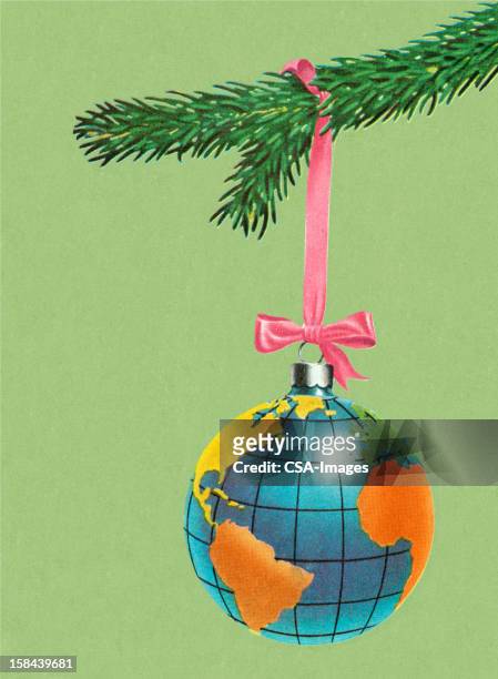 globe christmas tree ornament - christmas tree close up stock illustrations