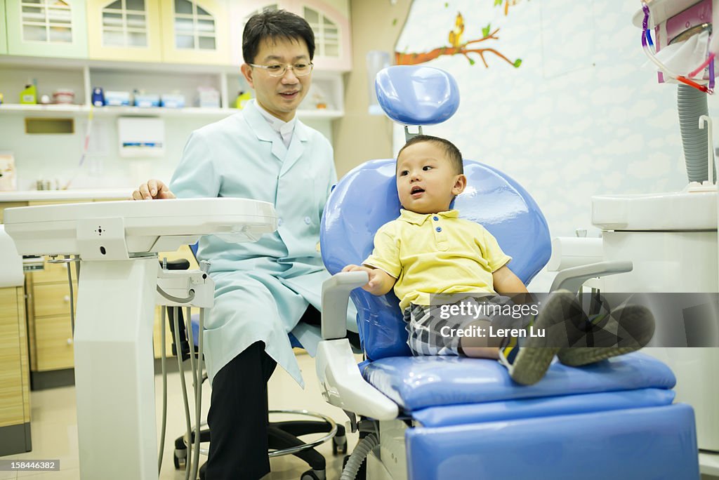Dentist builds trust with the child