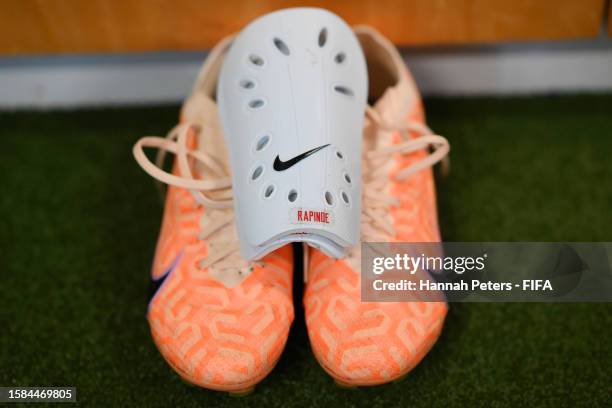 Shin guards and boots of Megan Rapinoe are displayed in the USA dressing room prior to the FIFA Women's World Cup Australia & New Zealand 2023 Group...