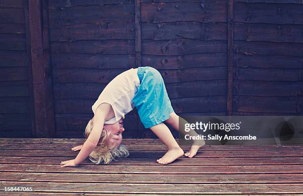 little boy upside down - leaning over stock pictures, royalty-free photos & images