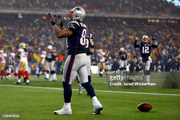 Tight end Aaron Hernandez of the New England Patriots celebrates after scoring a touchdown thrown by quarterback Tom Brady of the New England...