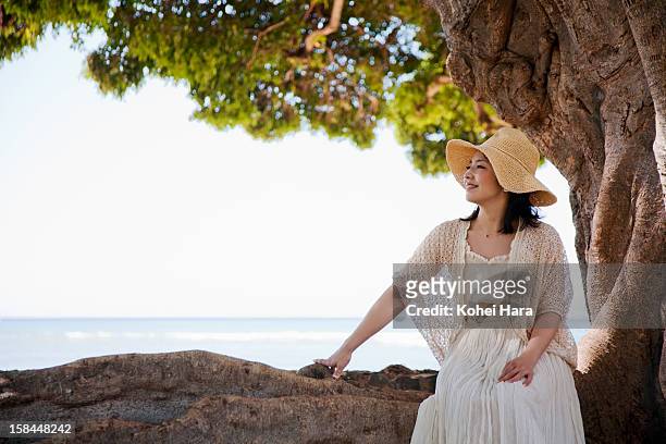 a woman relaxed at seaside - kailua stock pictures, royalty-free photos & images