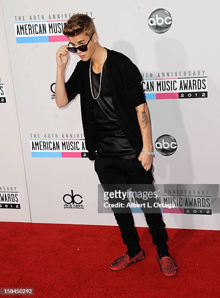 Singer Justin Bieber arrives for the 40th Anniversary American Music Awards - Arrivals held at Nokia Theater L.A. Live on November 18, 2012 in Los...