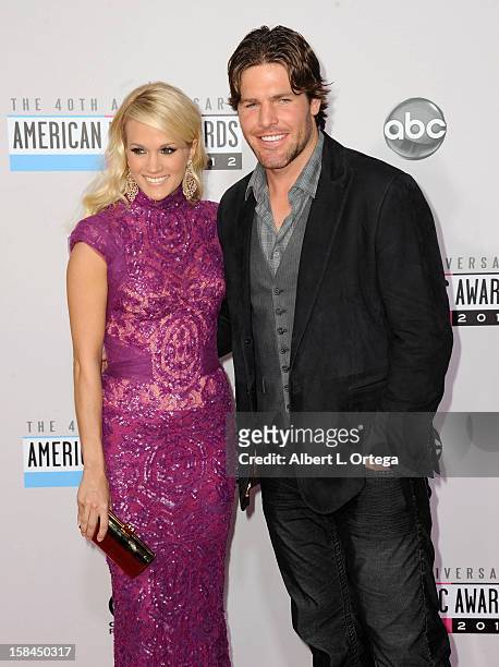 Singer Carrie Underwood and NHL player Mike Fisher arrive for the 40th Anniversary American Music Awards - Arrivals held at Nokia Theater L.A. Live...