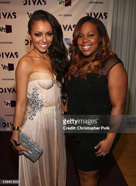 Actors Kat Graham and Amber Riley attend "VH1 Divas" 2012 at The Shrine Auditorium on December 16, 2012 in Los Angeles, California.