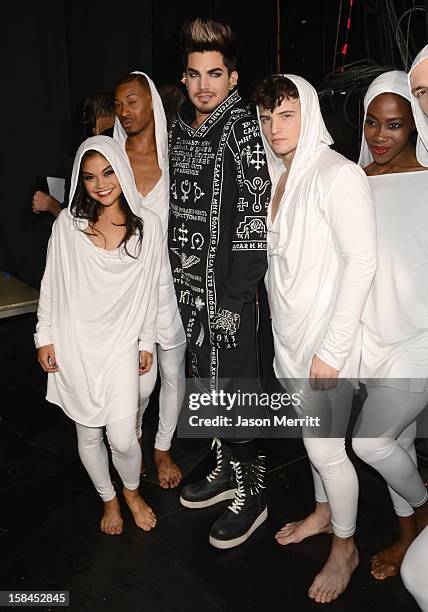 Host Adam Lambert poses backstage with dancers at "VH1 Divas" 2012 held at The Shrine Auditorium on December 16, 2012 in Los Angeles, California.