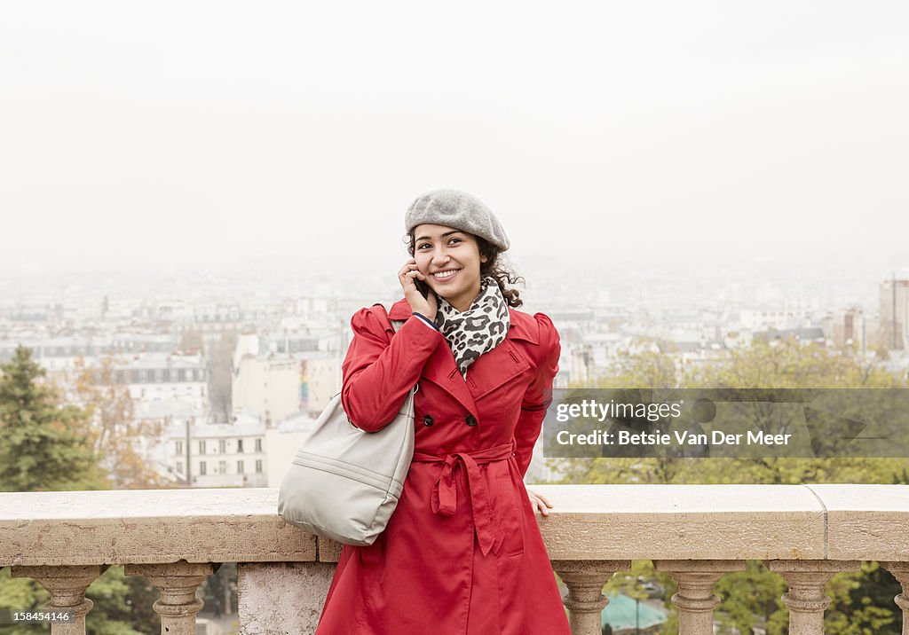 Woman on phone,Montmartre, view of  Paris