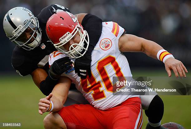 Michael Huff of the Oakland Raiders breaks up a pass to Peyton Hillis of the Kansas City Chiefs in the third quarter at Oakland-Alameda County...