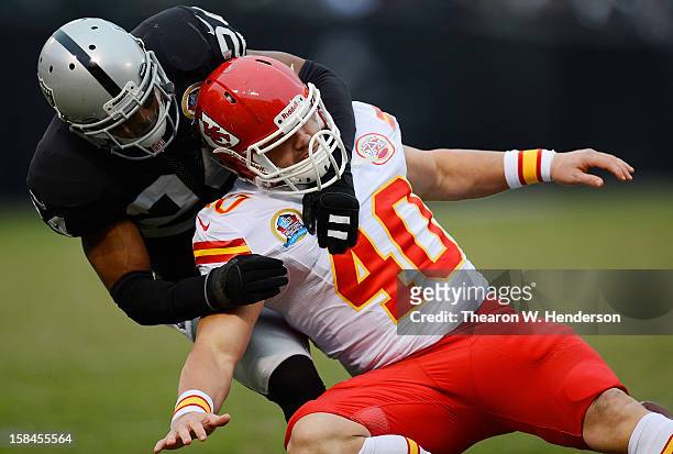 Michael Huff of the Oakland Raiders breaks up a pass to Peyton Hillis of the Kansas City Chiefs in the third quarter at Oakland-Alameda County...