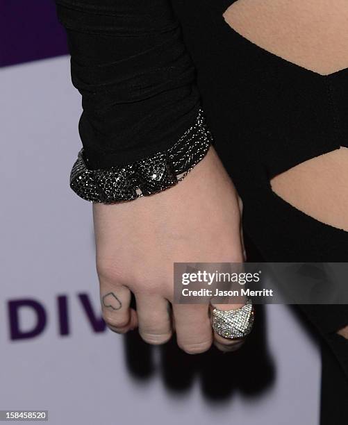 Singer Miley Cyrus arrives at 'VH1 Divas' 2012 held at The Shrine Auditorium on December 16, 2012 in Los Angeles, California.
