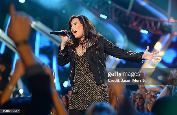 Singer Demi Lovato performs onstage at 'VH1 Divas' 2012 held at The Shrine Auditorium on December 16, 2012 in Los Angeles, California.