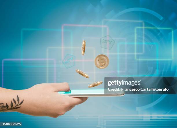 woman using smartphone and working with blockchain technologies - auction bid stock pictures, royalty-free photos & images