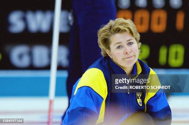 Elisabet Gustafson the skip for the Swedish curling team react to a bad stone delivery during her team's tie brake match against Great Britain 19...
