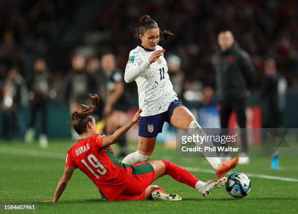 Sophia Smith of USA is tackled by Diana Gomes of Portugal during the FIFA Women's World Cup Australia & New Zealand 2023 Group E match between...