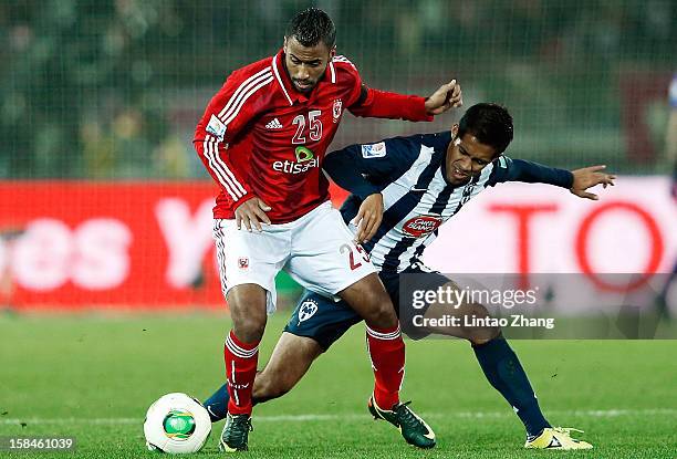 Severo Meza of Monterrey challenges Hossam Ashour of Al-Ahly SC during the FIFA Club World Cup 3rd Place Match between Al-Ahly SC and CF Monterrey at...