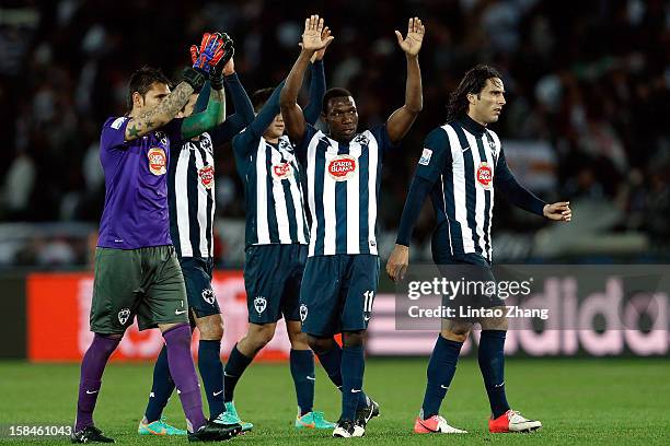 Aldo De Nigris celebrates with teammates after winning the FIFA Club World Cup 3rd Place Match between Al-Ahly SC and CF Monterrey at International...