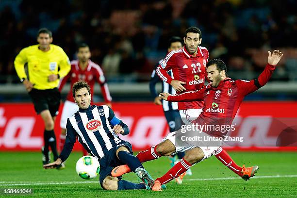 Jose Maria Basanta of Monterrey challenges Emad Meteab of Al-Ahly SC during the FIFA Club World Cup 3rd Place Match between Al-Ahly SC and CF...