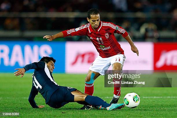 Ricardo Osorio of Monterrey challenges Walid Soliman of Al-Ahly SC during the FIFA Club World Cup 3rd Place Match between Al-Ahly SC and CF Monterrey...