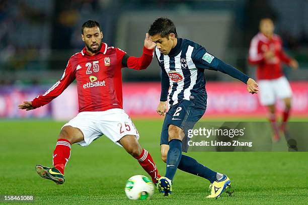 Severo Meza of Monterrey challenges Hossam Ashour of Al-Ahly SC during the FIFA Club World Cup 3rd Place Match between Al-Ahly SC and CF Monterrey at...