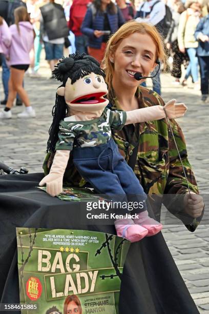 Performer promotes her Edinburgh Festival Fringe show on the Royal Mile, on August 8, 2023 in Edinburgh, Scotland.