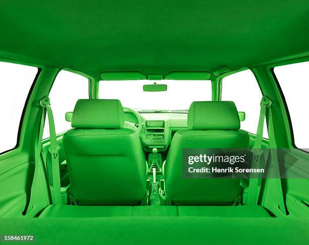 green car, environment- in the back of the car - car back seat stock pictures, royalty-free photos & images