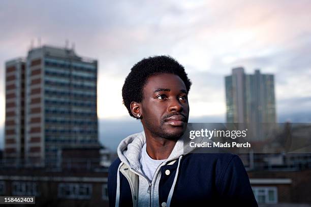 urban shoot, east london - man looking at foreground stock pictures, royalty-free photos & images