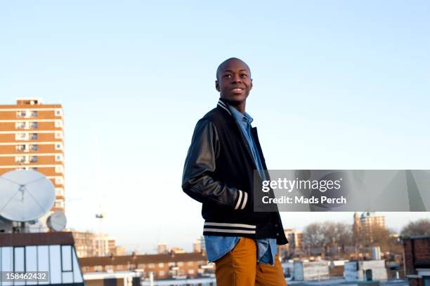 urban shoot, east london - man on top of building stock pictures, royalty-free photos & images