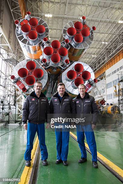 In this handout image provided by NASA, Expedition 34/35 Flight Engineer Chris Hadfield of the Canadian Space Agency, Soyuz Commander Roman Romanenko...