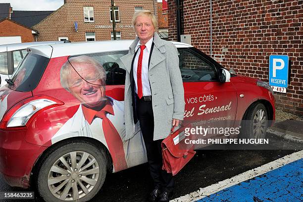 The Bourgmestre of Estaimpuis Daniel Senesael poses in front of his car on December 17, 2012 in Estampuis in the province of Hainaut near Nechin,...
