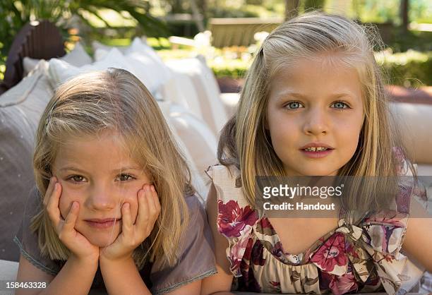 In this handout image provided by the Spanish Royal Household, the portraits of Princess Sofia of Spain and Princess Leonor of Spain, taken in August...