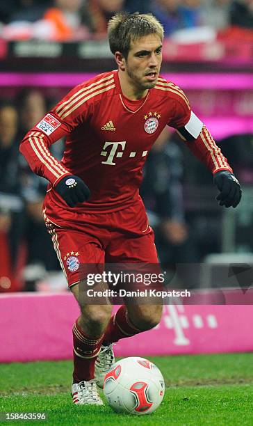 Philipp Lahm of Muenchen controles the ball during the Bundesliga match between FC Bayern Muenchen and VfL Borussia Moenchengladbach at Allianz Arena...
