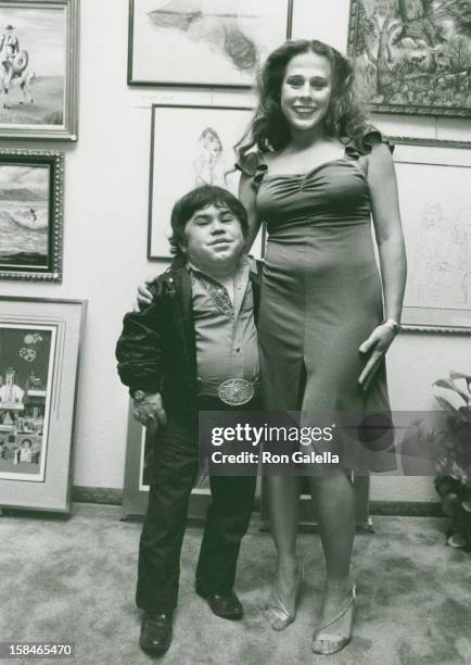 Actor Herve Villechaize and date Sharon Peters attending "Celebrity Art Exhibit" on March 14, 1983 at the Century Plaza Hotel in Century City,...