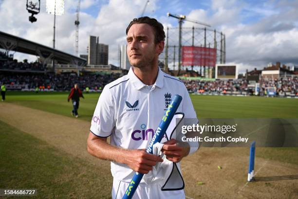 Stuart Broad of England holds a stump following Day Five of the LV= Insurance Ashes 5th Test Match between England and Australia at The Kia Oval on...