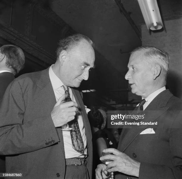 Patrick Balfour, 3rd Baron Kinross , and Arthur Tedder, 1st Baron Tedder , in conversation at an event, October 12th 1959.