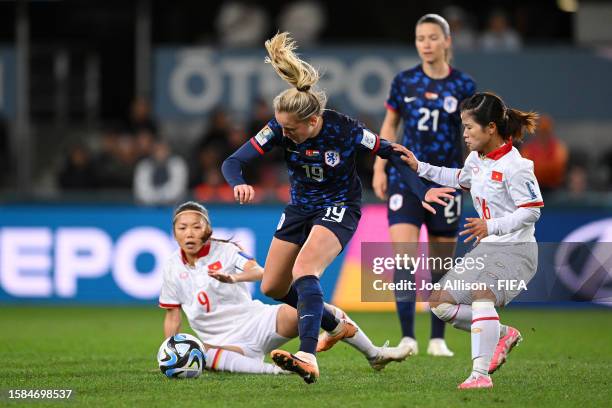 Wieke Kaptein of Netherlands is challenged by Duong Thi Van of Vietnam during the FIFA Women's World Cup Australia & New Zealand 2023 Group E match...
