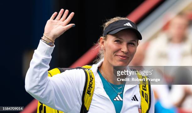 Caroline Wozniacki of Denmark walks onto the court to play against Kimberly Birrell of Australia in the first round on Day 2 of the National Bank...