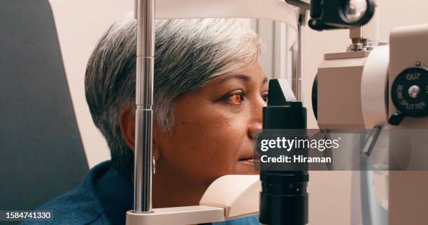 consulting, healthcare and ophthalmology with woman and eye exam for research, vision and results. medicine, medical and optometry with patient and machine for glaucoma test, check and analysis - eye exam stockfoto's en -beelden