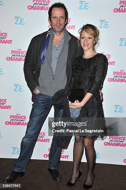 Christian Vadim and Julia Livage pose during the "Un Prince Charmant" film premiere at Cinema Gaumont Marignan on December 17, 2012 in Paris, France.