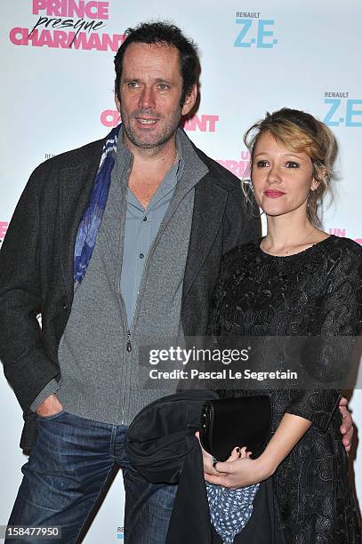 Christian Vadim and Julia Livage pose during the "Un Prince Charmant" film premiere at Cinema Gaumont Marignan on December 17, 2012 in Paris, France.