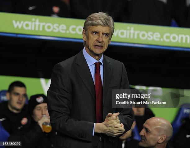 Manager Arsene Wenger of Arsenal looks on before the Barclays Premier League match between Reading and Arsenal at Madejski Stadium on December 17,...