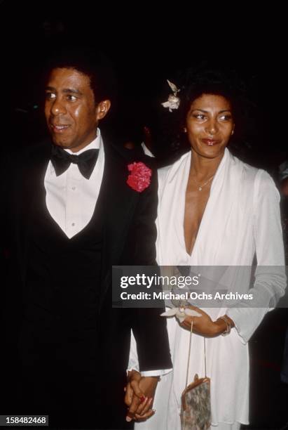 Comedian and actor Richard Pryor and actress Pam Grier attend the 19th Annual Grammy Awards at The Hollywood Palladium in Los Angeles, California.