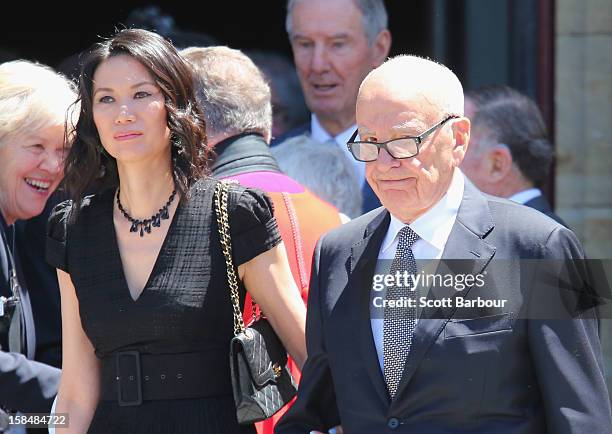 Rupert Murdoch and his wife Wendi Deng Murdoch leave after attending the Dame Elisabeth Murdoch public memorial at St Paul's Cathedral on December...