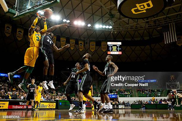 Cory Jefferson of the Baylor University Bears dunks the ball over Jodd Maxey of the USC Upstate Spartans on December 17, 2012 at the Ferrell Center...