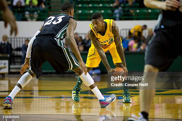 Walton of the Baylor University Bears brings the ball up the court against the USC Upstate Spartans on December 17, 2012 at the Ferrell Center in...