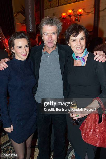 Salome Stevenin, Philippe Carroy and Claire Nebout pose at restaurant Le Grand Colbert on December 17, 2012 in Paris, France.