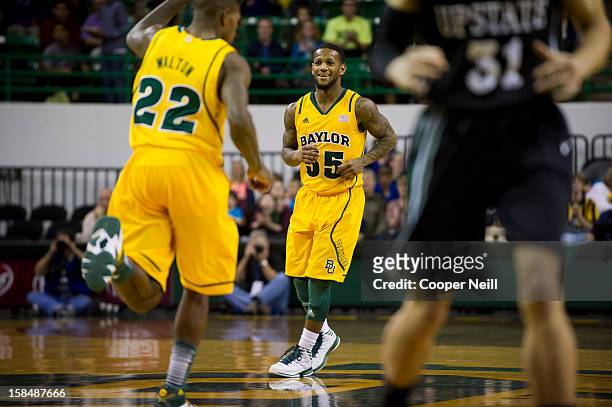 Pierre Jackson of the Baylor University Bears smiles after a made 3-pointer against the USC Upstate Spartans on December 17, 2012 at the Ferrell...